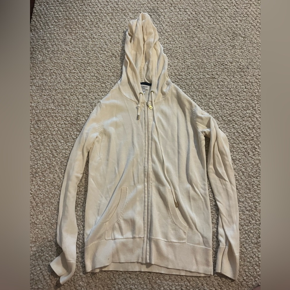 Thick, warm, zip up with golden accents!